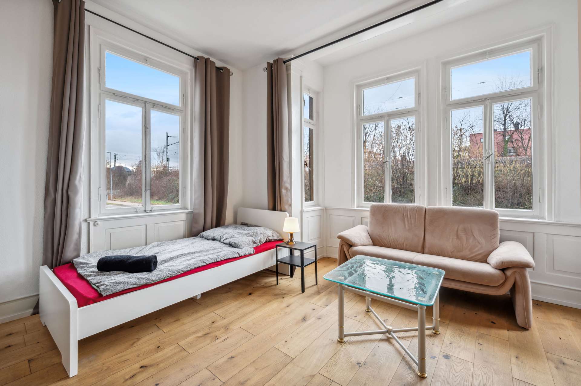 Room with bay window and seating area at Silcherstraße 13
